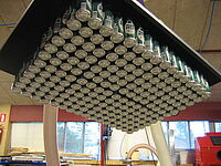 AERO-LIFT tube lifter lifts cans in the food industry