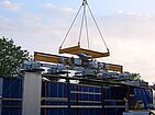 Heavy duty vacuum lifter up to 20,000 kg is lifted into the air by crane