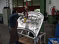 Engine hood is transported with the help of a vacuum lifter from the company AERO-LIFT