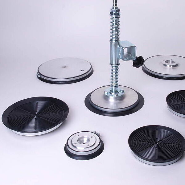 several round suction plates in the overview of vacuum components
