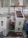 Air-conditioning cabinet is transported with vacuum lifter of the company AERO-LIFT