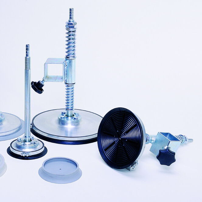 Detail view of suction plates, suspension bolts and springs, joints and accessories of vacuum components