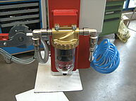 Accessories detail picture of a water separator with battery device of vacuum lifter