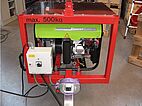mains-independent vacuum lifter with power unit in a workshop