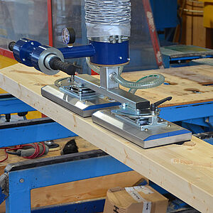 VUSS surface gripper lifts wood with recesses