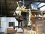 Vacuum lifter of the company AERO-LIFT furniture, chairs, desk top in the wood industry for handling with wood.